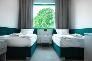 Отель Hotel Promenada Biznes & Wypoczynek Радом Улучшенный двухместный номер с 2 отдельными кроватями-1
